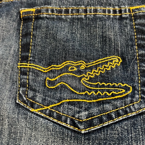 Lacoste Dresses & Skirts - Lacoste Dark Blue Denim Skirt with Yellow Stitching also Florida Gator sporty